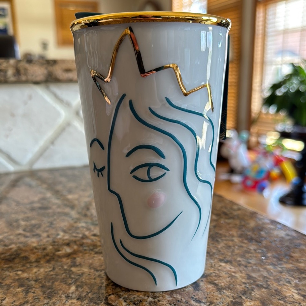 Starbucks White and Gold Mug with Artistic Face Design